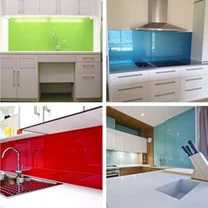 Colored Glass Splashback And Worktop In Kitchen